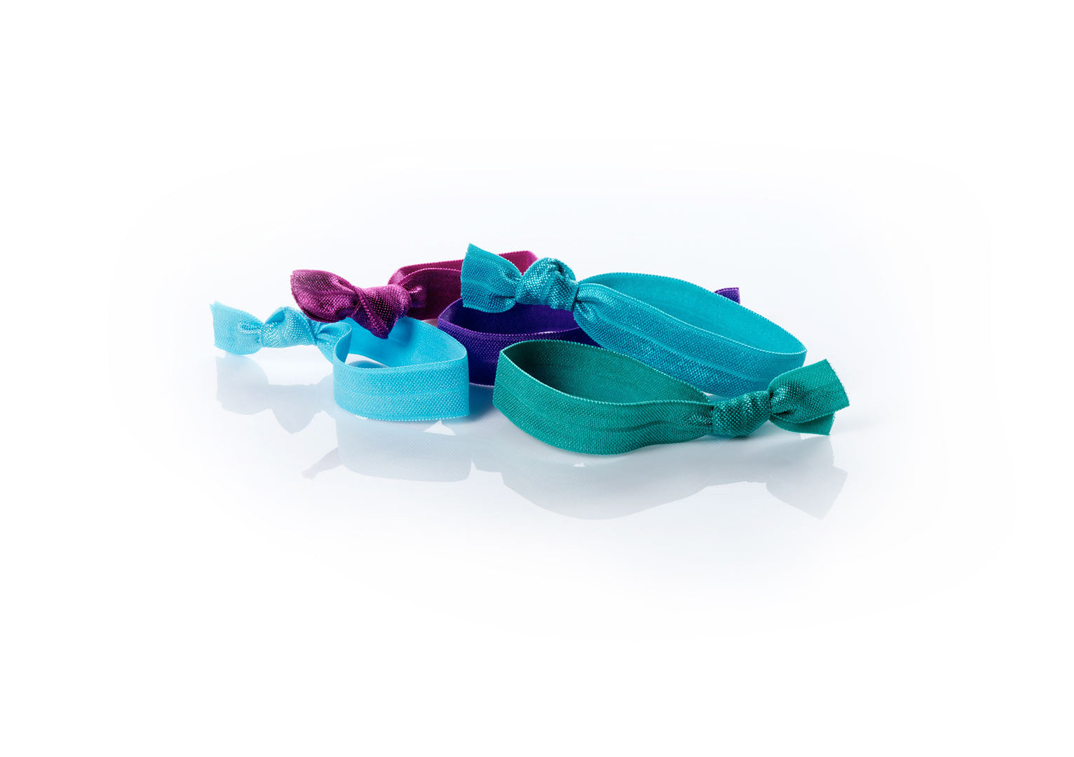 Vibrant - InStyler All Tied Up Hair Ties-Five ties in amethyst, aqua, turquoise, emerald and ruby. Laid on white background.